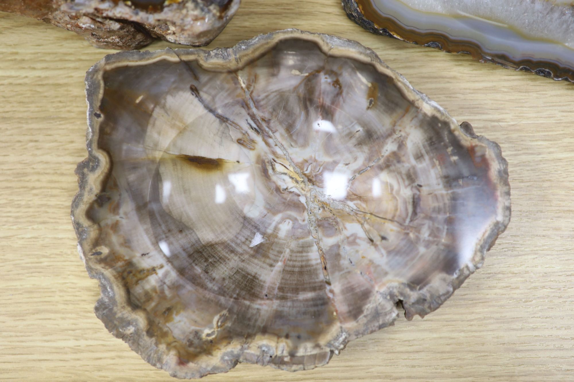 An amethyst geode section and assorted mineral specimens